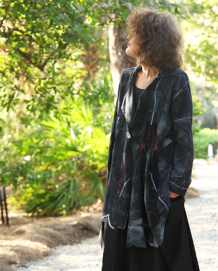 avant-garde asymmetrical black midi jacket