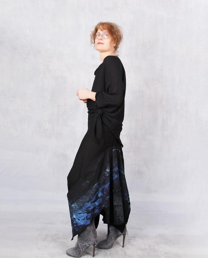 'befittingly full' long asymmetrical skirt