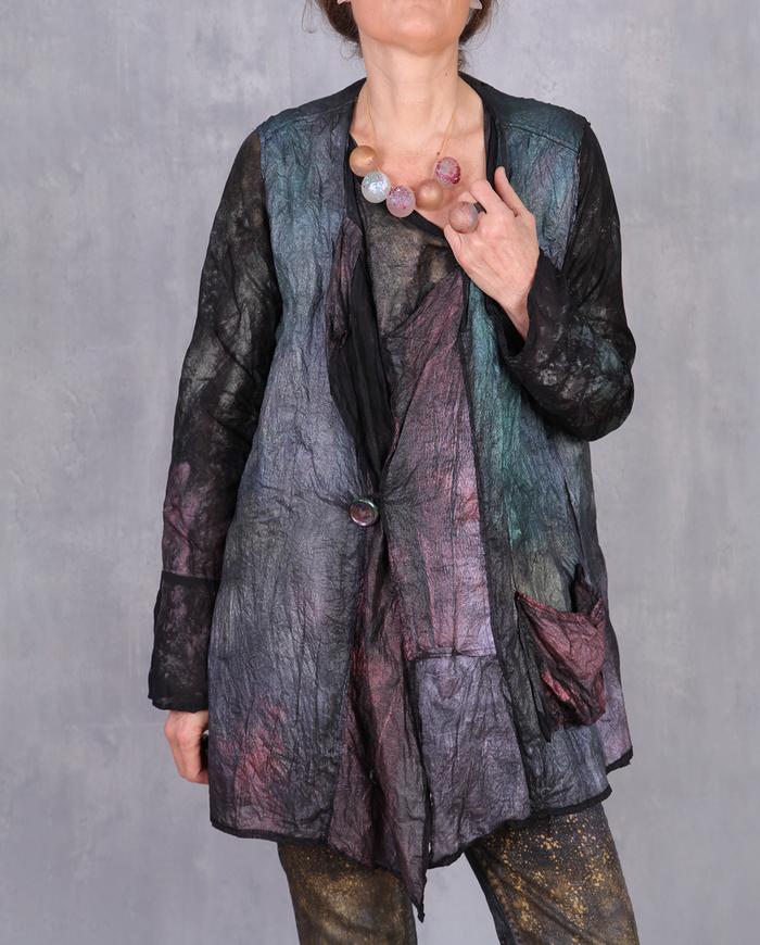'crispy and sparkly' weightless crinkled asymmetrical vest