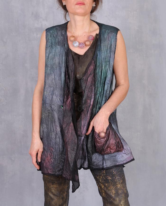 'crispy and sparkly' weightless crinkled asymmetrical vest
