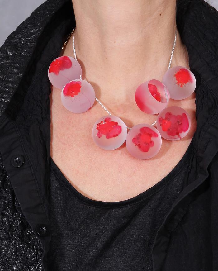 'abstract bouquet-to-wear' hand-carved chunky luminescent necklace