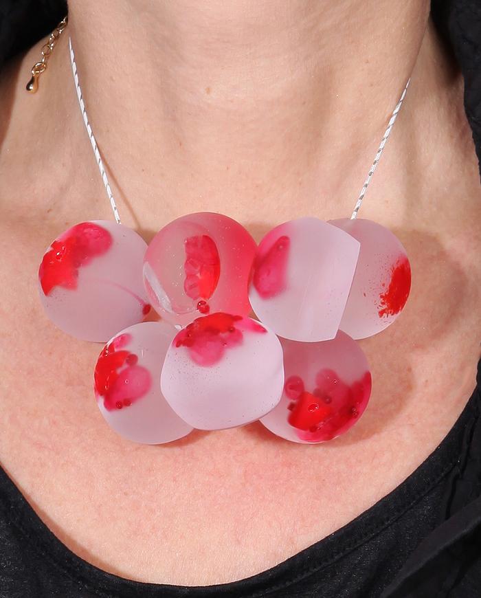 'abstract bouquet-to-wear' hand-carved chunky luminescent necklace