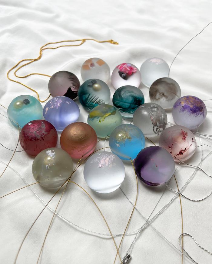 'stackable spheres' single bead glowing art necklace