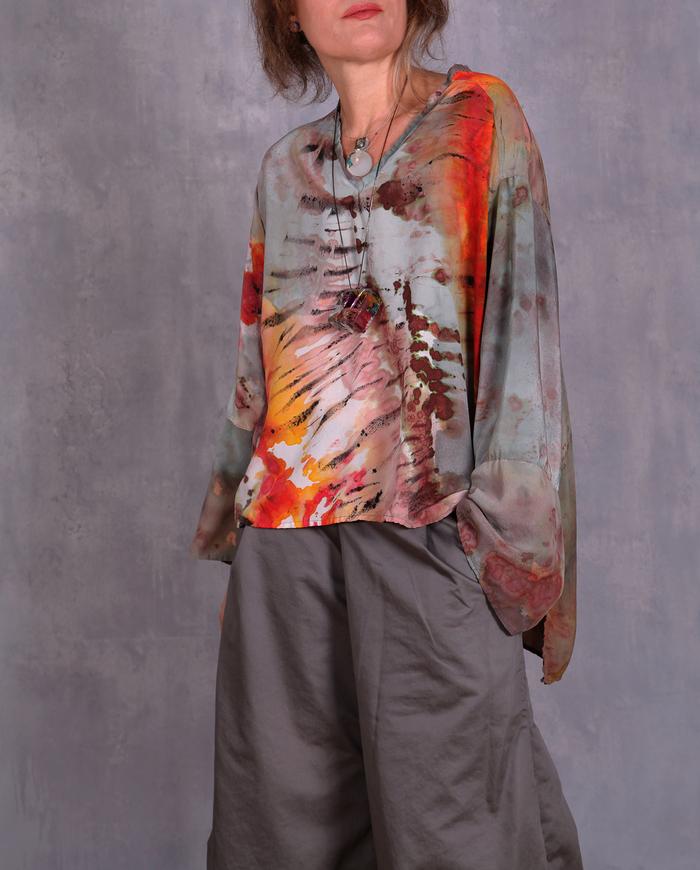 'a burst of energy' loose-fitting asymmetrical silk top