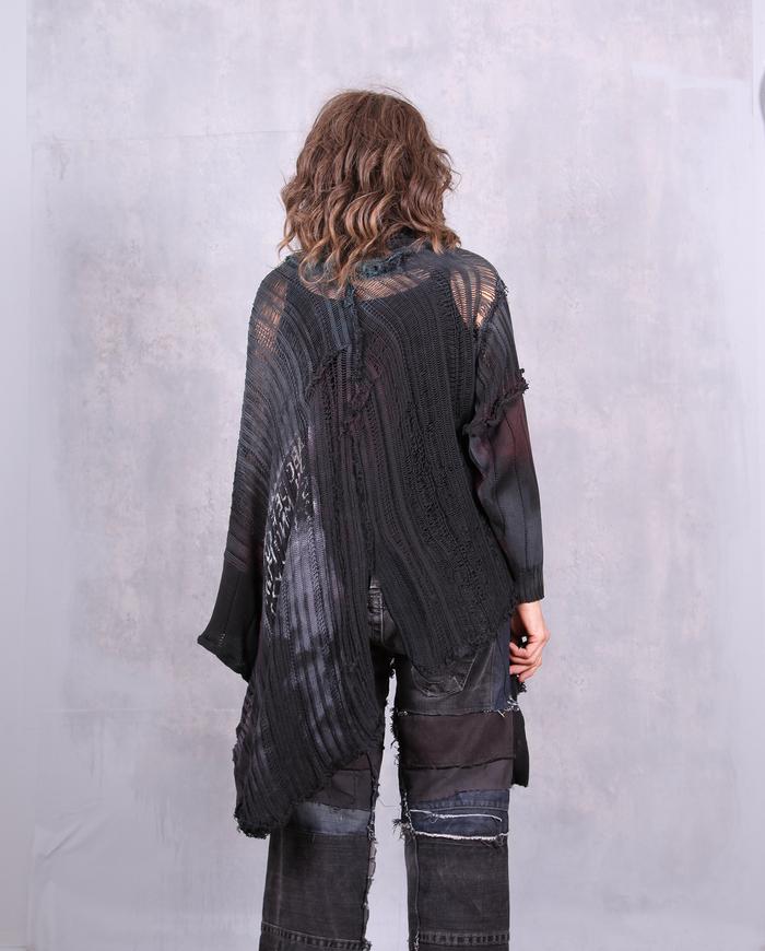 'in a knitted envelope' oversized poncho style sweater