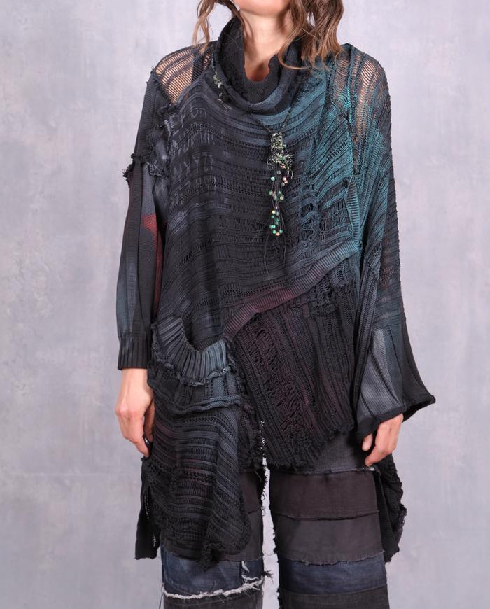 'in a knitted envelope' oversized poncho style sweater