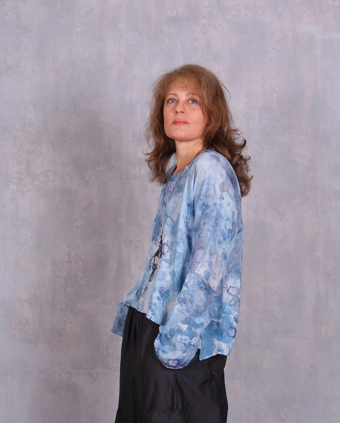 'the sky is flying' soft blue silk top