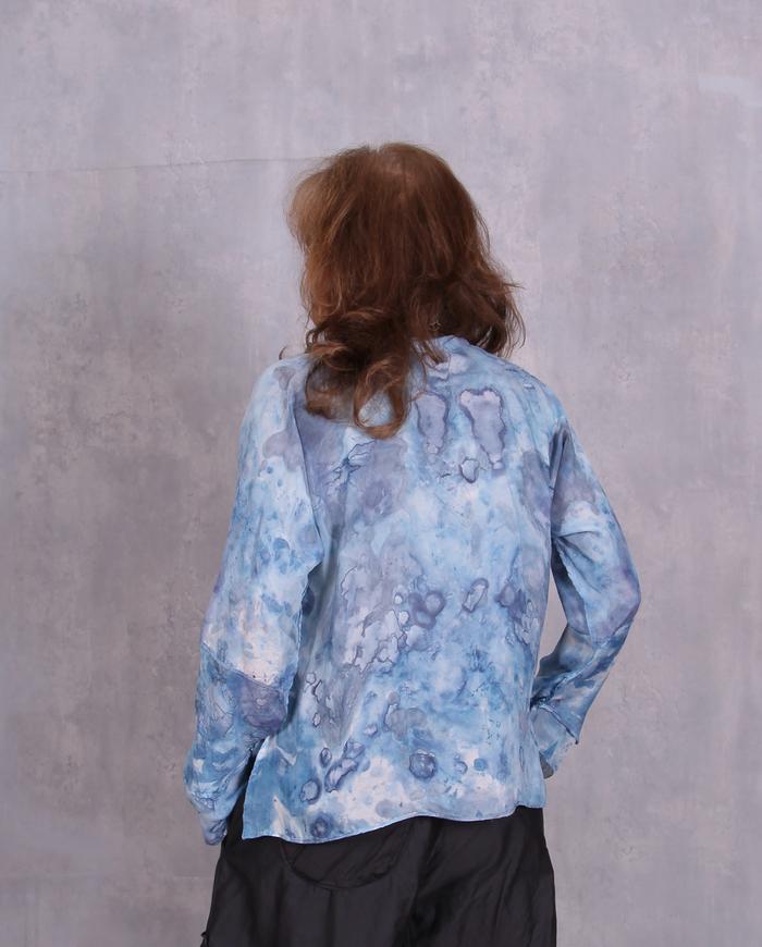 'the sky is flying' soft blue silk top