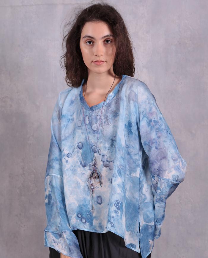 'the sky is flying' soft blue silk top