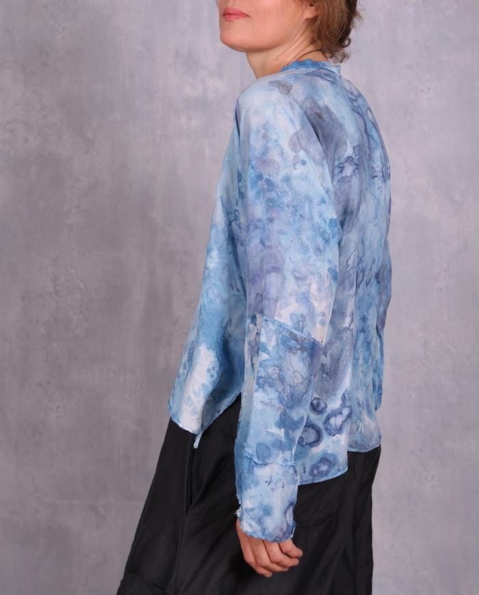 'the sky is flying' soft blue silk top