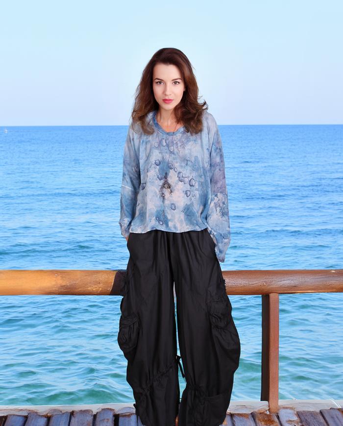 'the sky is flying' soft blue silk top