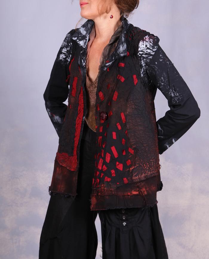 'beauty of the draw' detailed red and black jacket