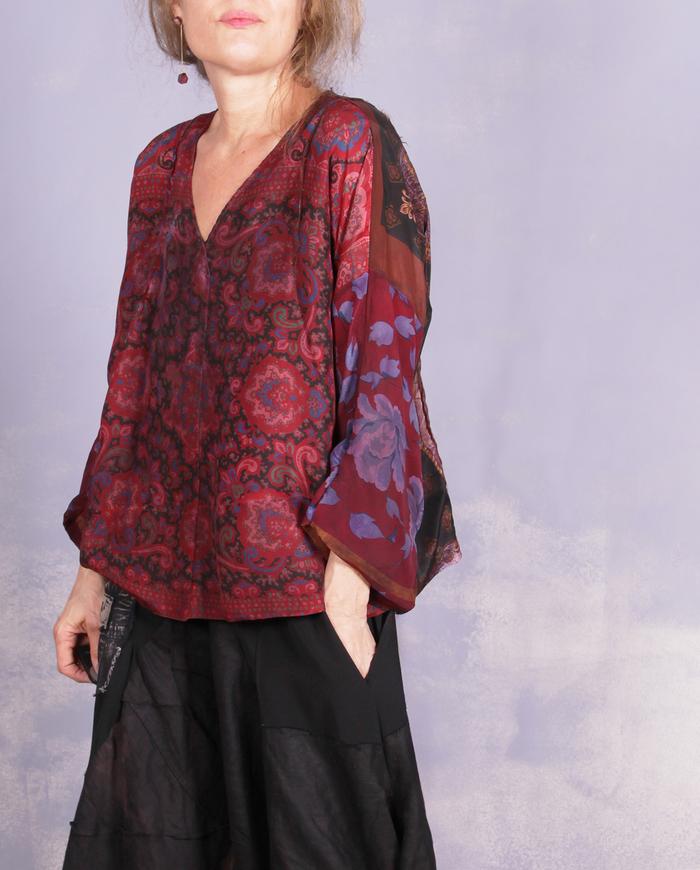 'a delicate enigma' mixed patterns silk blouse