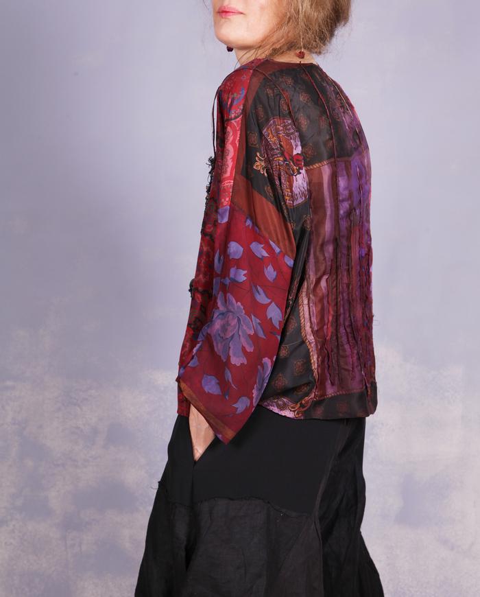 'a delicate enigma' mixed patterns silk blouse