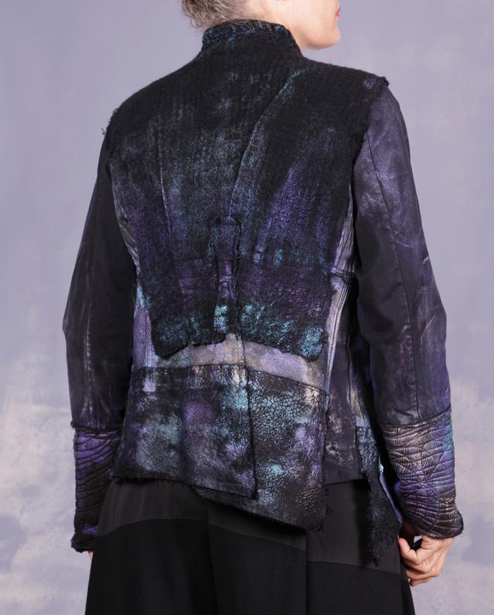 'a cozy modern cocoon' mixed fabrics fitted asymmetrical jacket