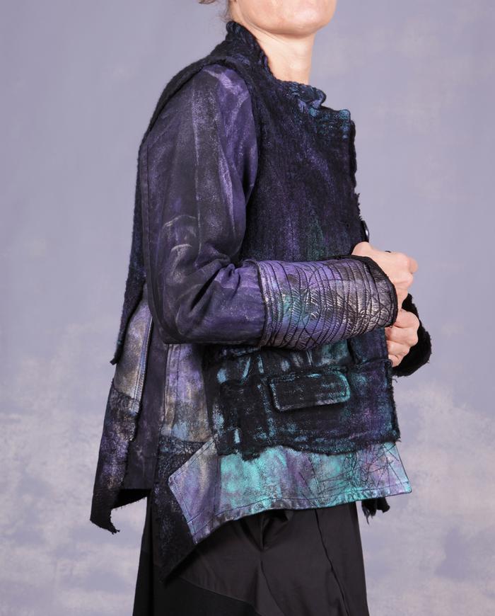 'a cozy modern cocoon' mixed fabrics fitted asymmetrical jacket