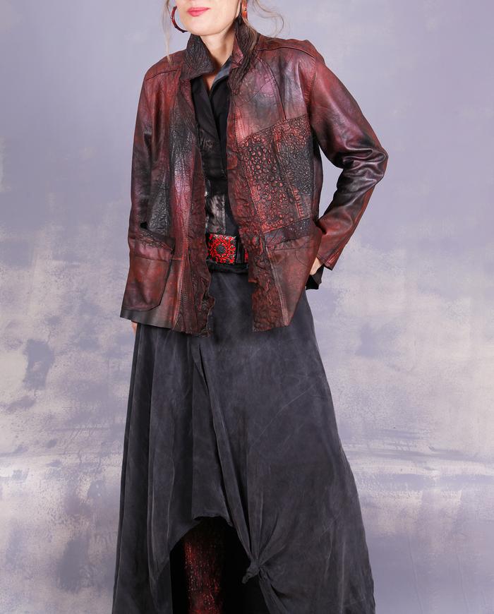 'the swirling fire' detailed leather belt with vintage buckle