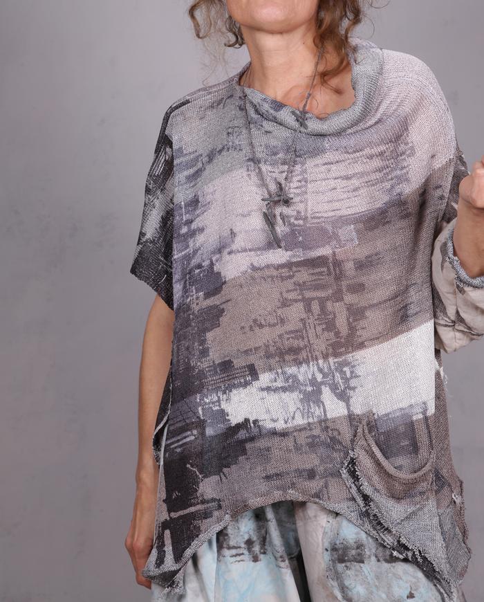 'over and in between' asymmetrical knit sweater