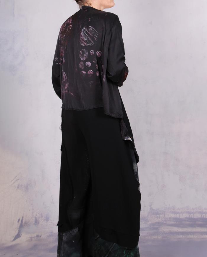 'no such thing as too much freedom' loose-fitting asymmetrical blouse