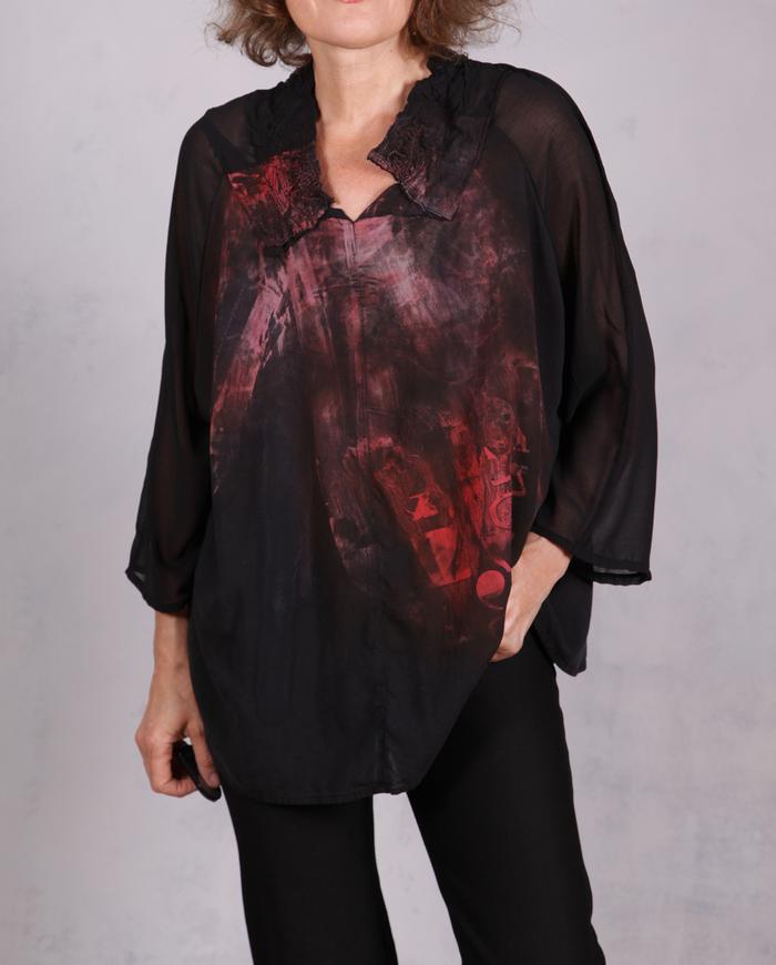 'light on the horizon' painted black blouse