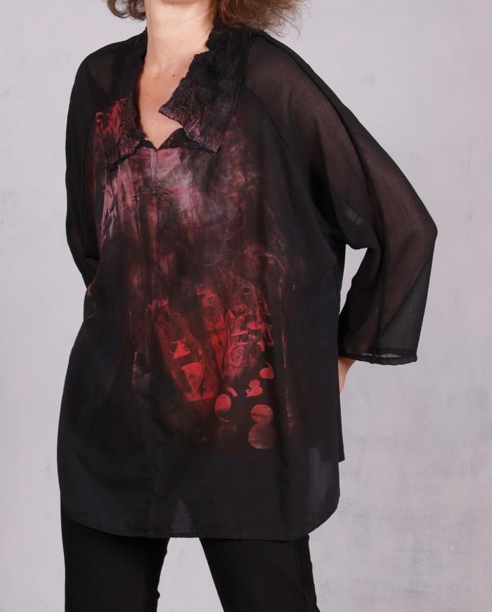 'light on the horizon' painted black blouse