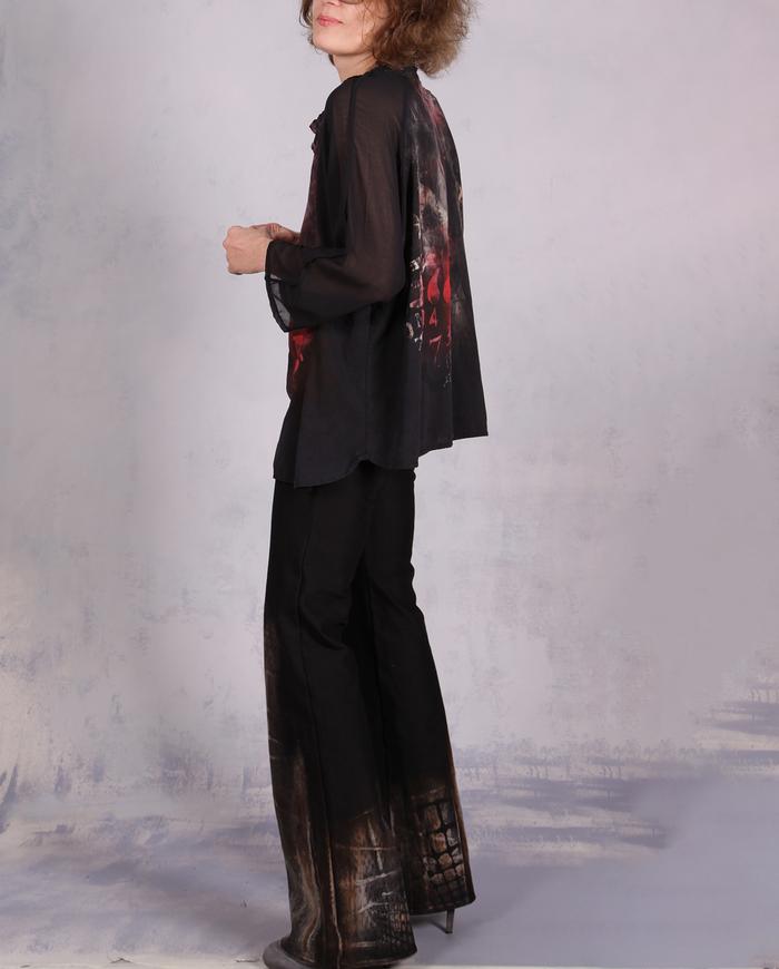 'light on the horizon' painted black blouse