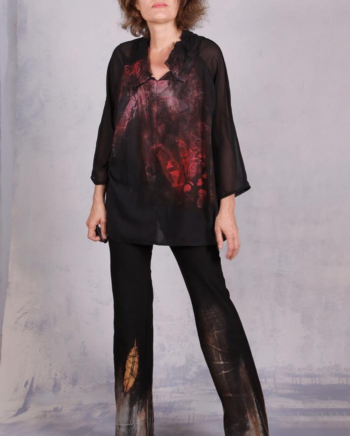 'light on the horizon' painted black blouse