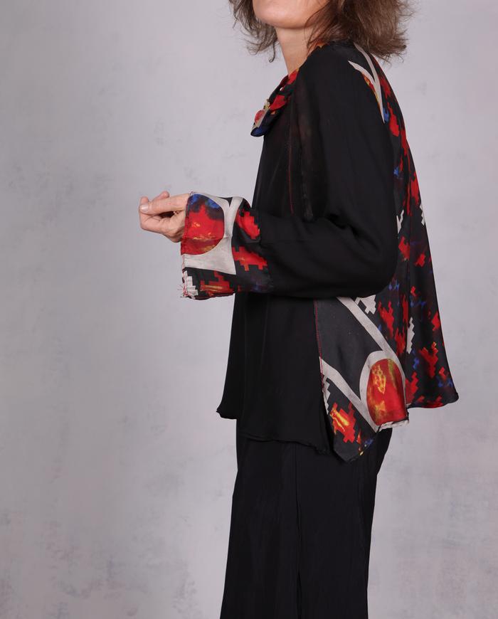 'playing a biased game' mixed silks asymmetrical high-contrast blouse