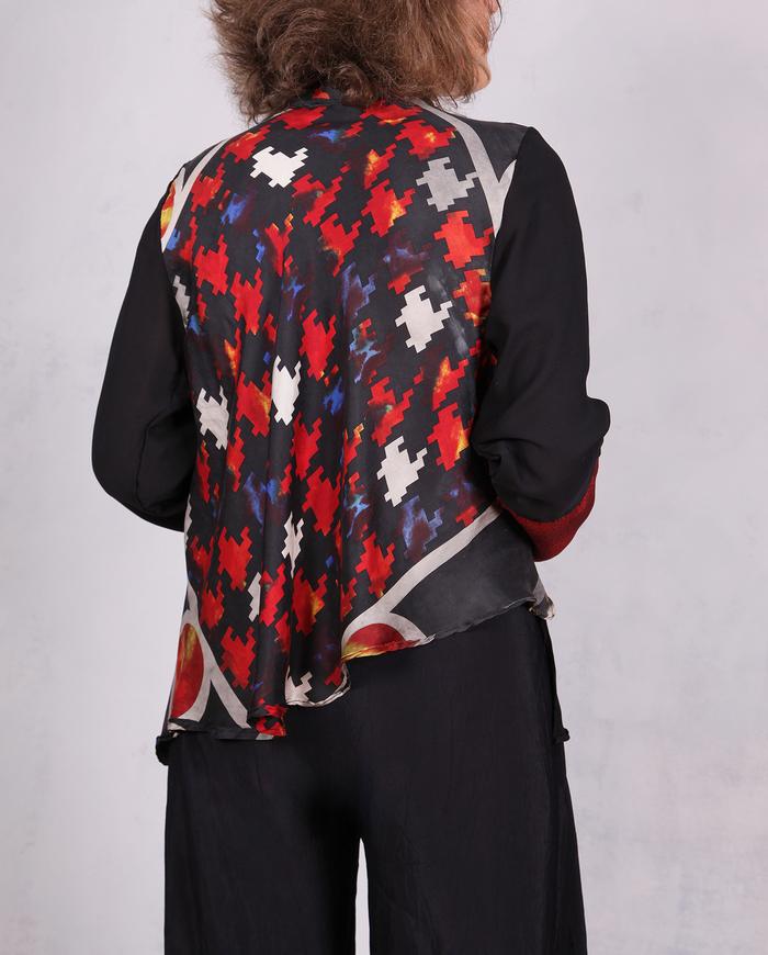 'playing a biased game' mixed silks asymmetrical high-contrast blouse