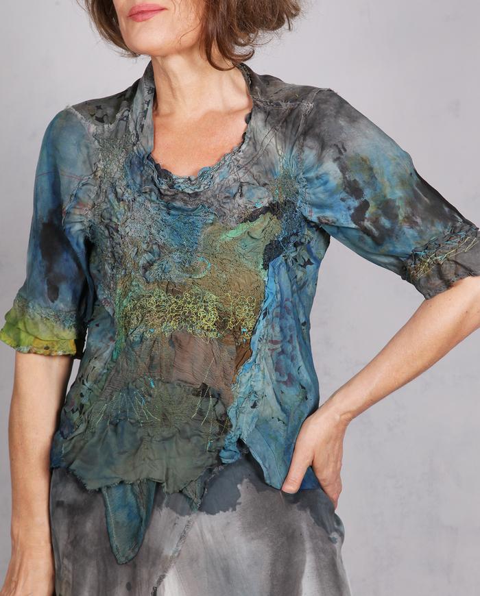 'a textured breeze' detailed asymmetrical silk blouse