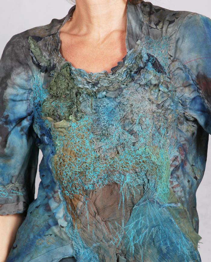 'a textured breeze' detailed asymmetrical silk blouse