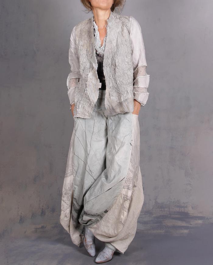 'on a misty cobblestone mountain' super detailed couture jacket