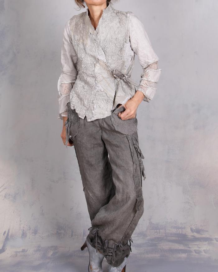 'on a misty cobblestone mountain' super detailed couture jacket