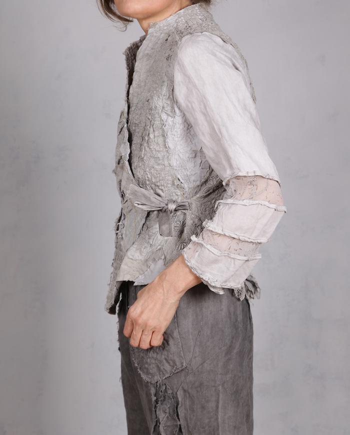'on a misty cobblestone mountain' super detailed couture jacket