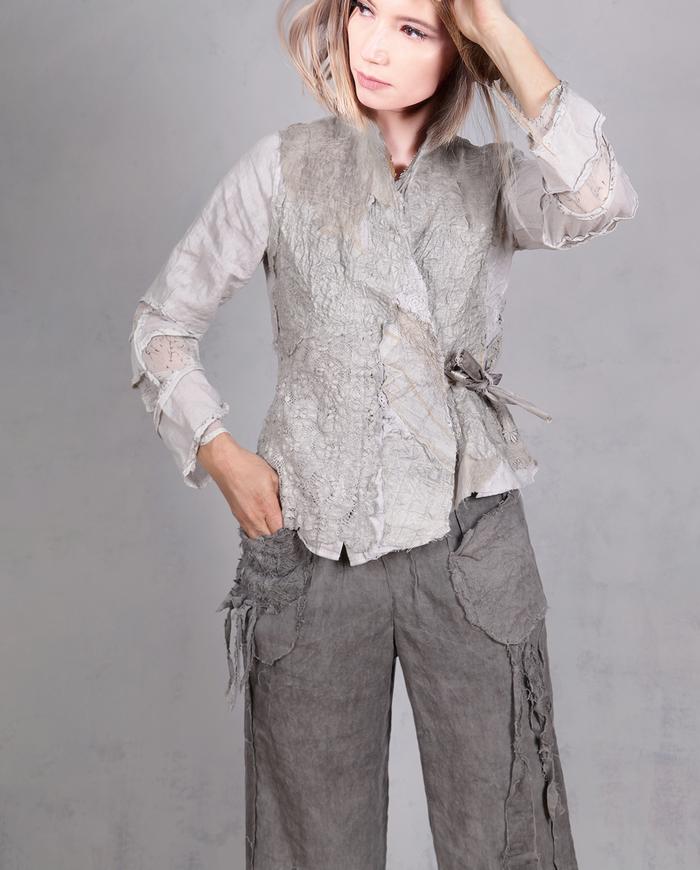'on a misty cobblestone mountain' super detailed couture jacket