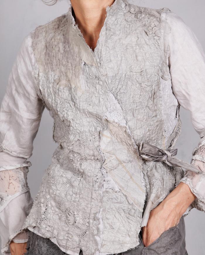 'on a misty cobblestone mountain' super detailed couture jacket