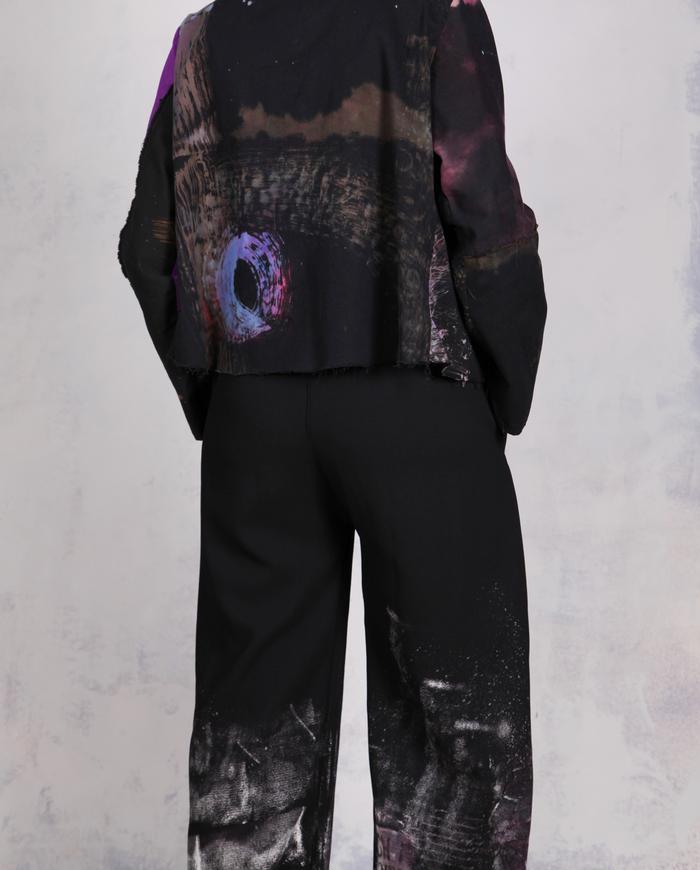 'every step I make' sculptural black painted trousers