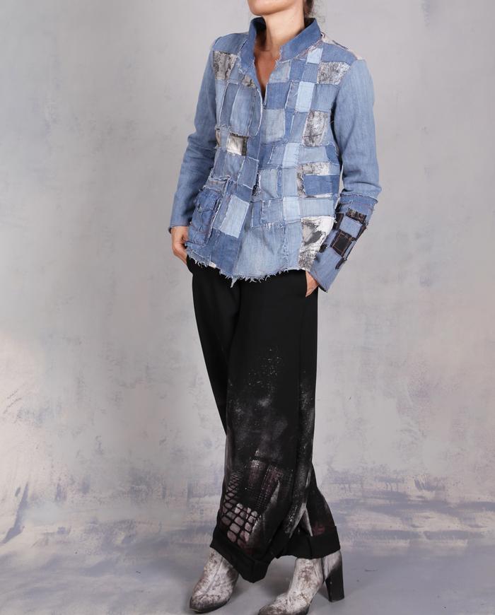 'every step I make' sculptural black painted trousers