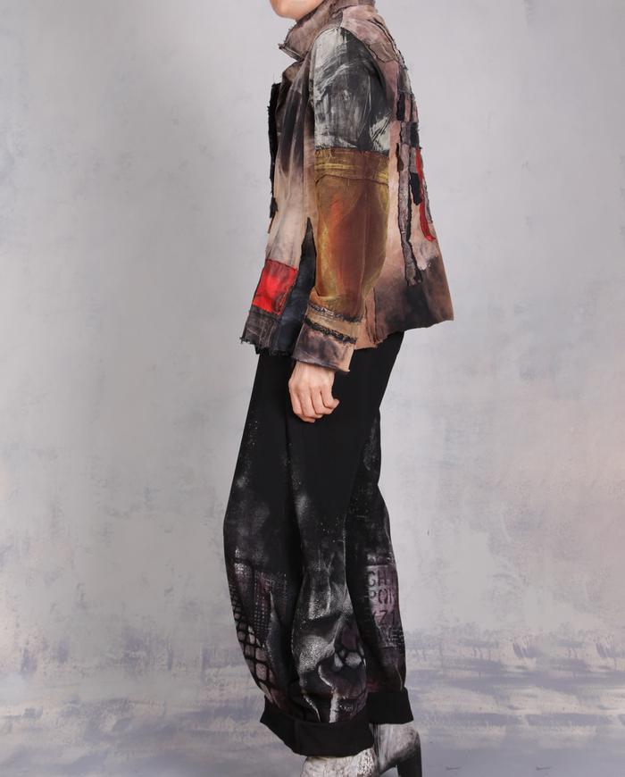 'every step I make' sculptural black painted trousers