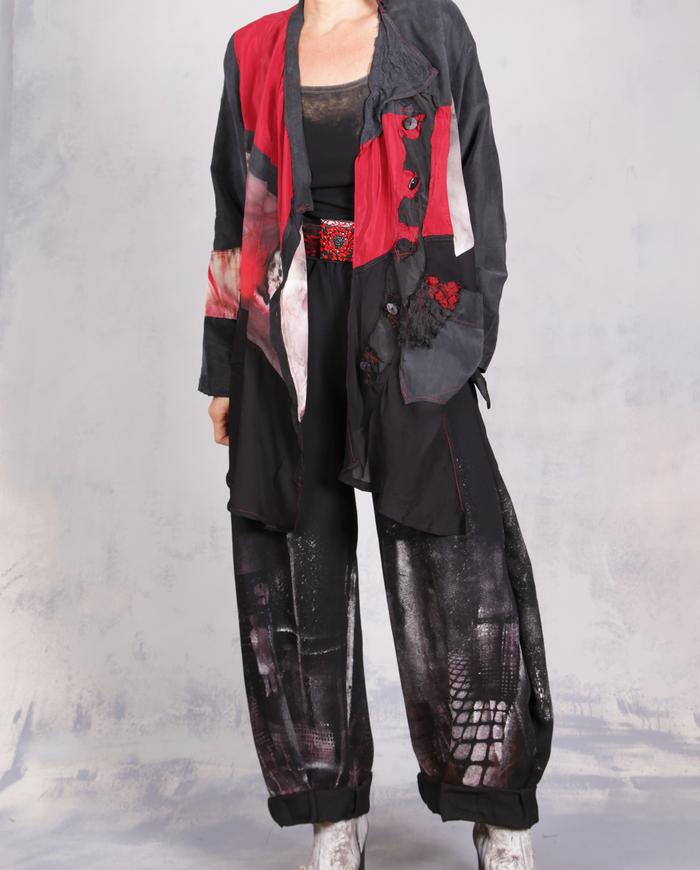 'every step I make' sculptural black painted trousers