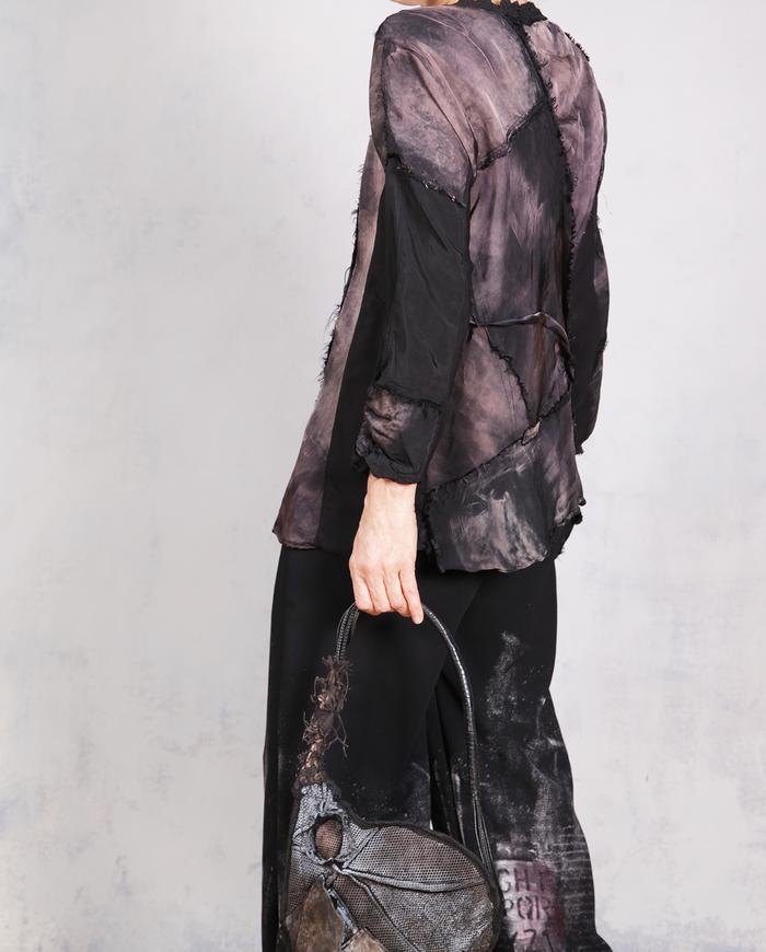 'follow the lines' distressed sculptural art top