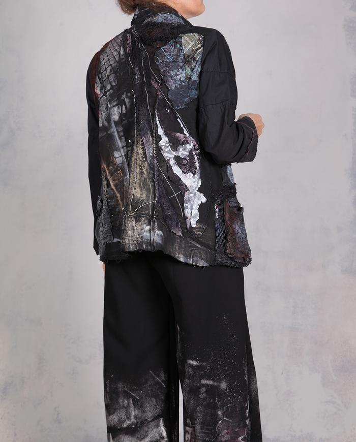 'on a tactile adventure' detailed black jacket