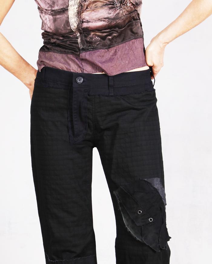 'full of surprises' bootcut detailed black trousers