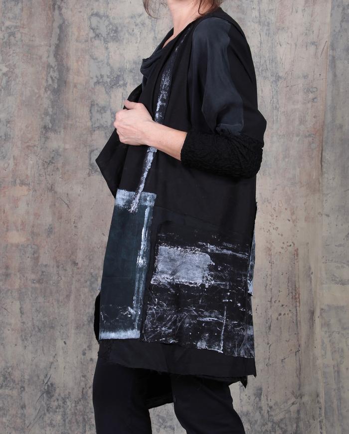 asymmetrical geometric patchwork black and white vest