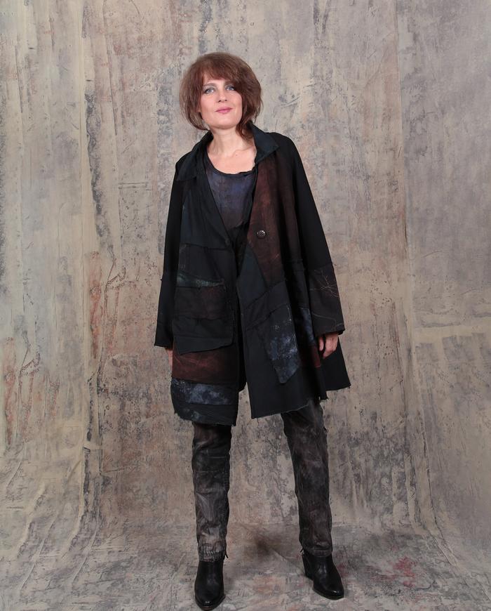 roomy black jacket with a touch of color