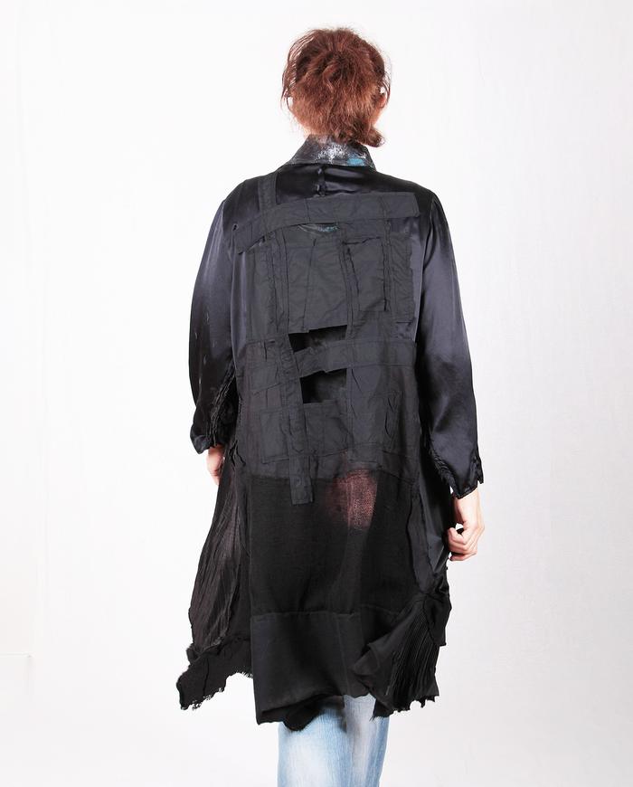 mixed fabrics cutout back mostly black drapey jacket