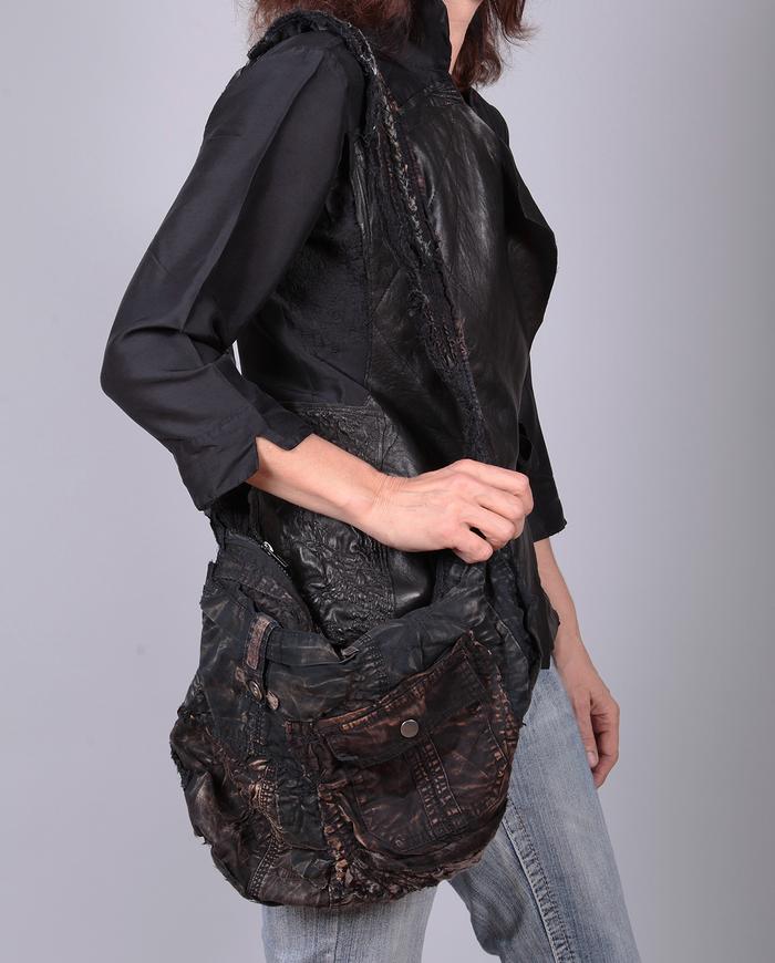 distressed hand textured black shoulder bag with pockets