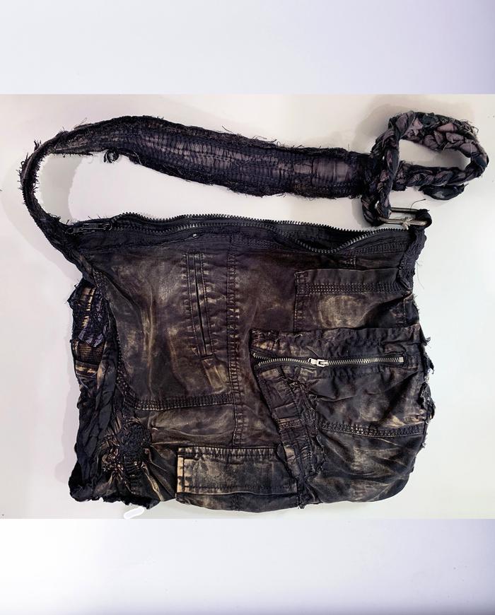 distressed hand textured black shoulder bag with pockets