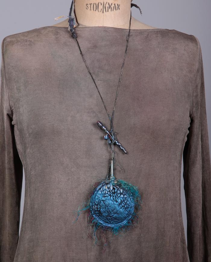 'blue eclipse' reversible leather and beads pendant