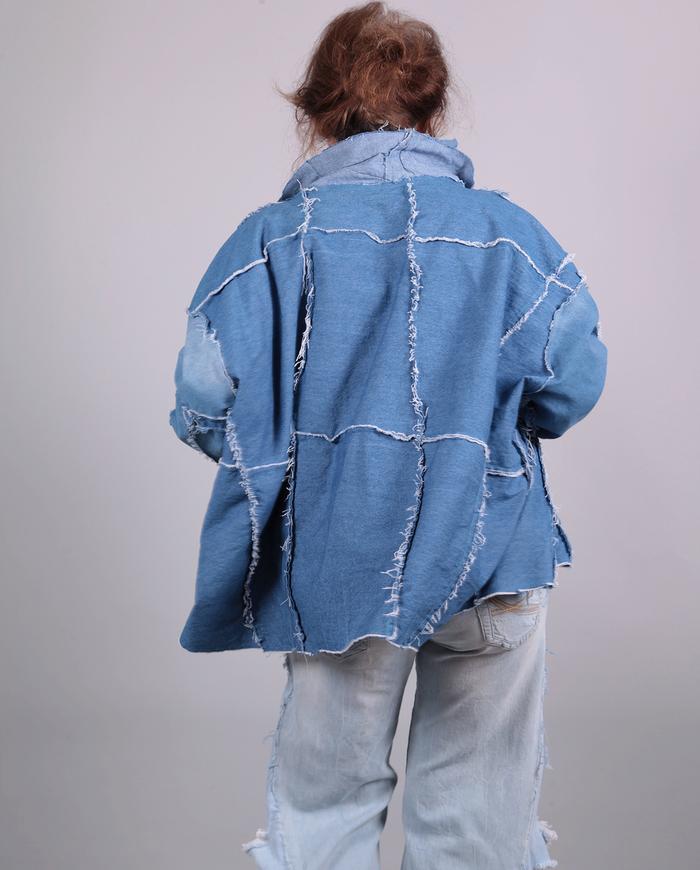 'stitched up' oversized denim jacket